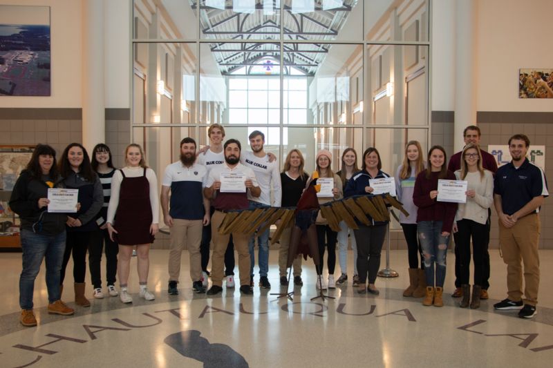 Fall Sports Scholar Athlete Team Award Recipients with Dr. Joshua Liddell