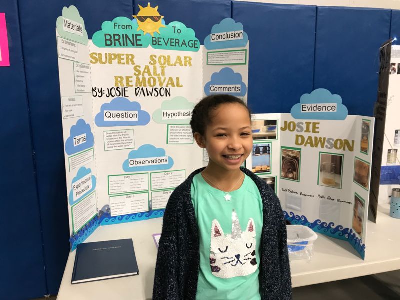 Student presenting her project at the science fair