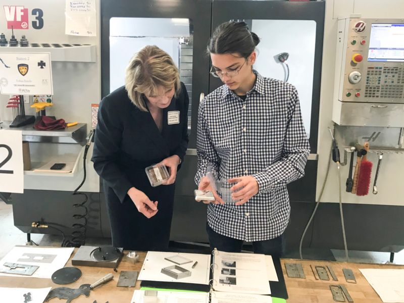 Senator Cathy Young with student in Manufacturing Lab